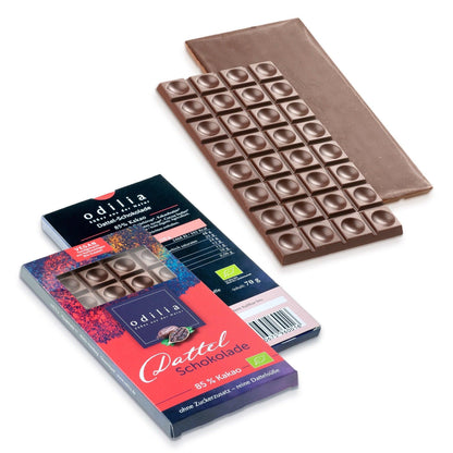 Dattelschokolade ohne Zuckerzusatz mit 85% Kakao, 70g Tafel. Dunkle Schokolade aus hochwertigen Kakaobohnen und süßen Datteln, ohne raffinierten Zucker.